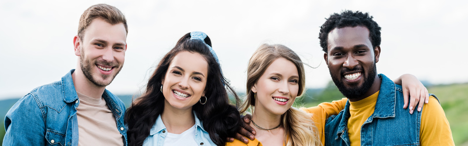Group of smiling teens and young adults, perfect teeth, dental care